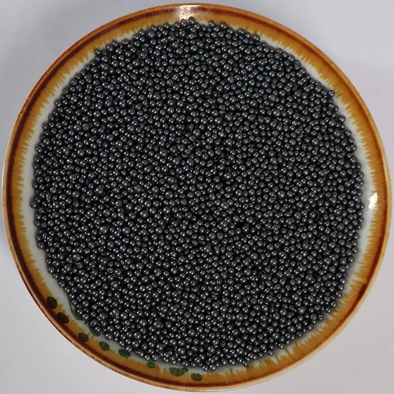 Cast steel shot abrasive particles
